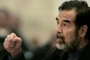 Saddam Hussein speaks to the judge during his trial February 13, 2006 in Baghdad