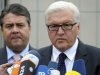 Faction leader of the oppositional German Social Democrats, SPD, Frank-Walter Steinmeier, right, and Head of the SPD Sigmar Gabriel, left, speak to the media after negotiations with the coalition government in Berlin, Germany, Thursday, June 21, 2012. They say they've reached a deal with Chancellor Angela Merkel's governing coalition that will allow them to ratify Europe's budget discipline pact. Merkel needs opposition support to secure the needed two-thirds majority in Parliament for the pact. (AP Photo/dapd Michael Gottschalk)