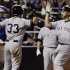 New York Yankees' Raul Ibanez, right, celebrates with teammate Nick Swisher (33) after hitting a three-run home run during the seventh inning of an interleague baseball game as New York Mets catcher Josh Thole looks on Saturday, June 23, 2012, in New York.  (AP Photo/Frank Franklin II)