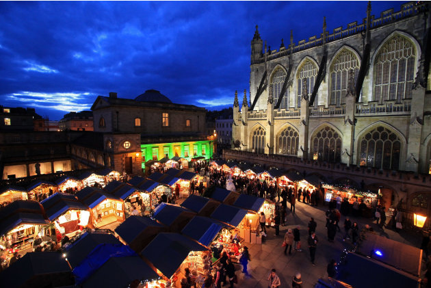 Visitors Enjoy The Stalls As Bath Christmas Market Opens