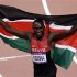 Kenya's David Lekuta Rudisha holds his national flag after winning the men's 800m final during the London 2012 Olympic Games