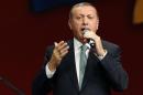 Turkish Prime Minister Erdogan speaks to supporters during his visit in Cologne
