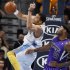Denver Nuggets forward JaVale McGee, left, pulls in a rebound in front of Sacramento Kings center DeMarcus Cousins in the first quarter of an NBA basketball game in Denver on Saturday, March 23, 2013. (AP Photo/David Zalubowski)