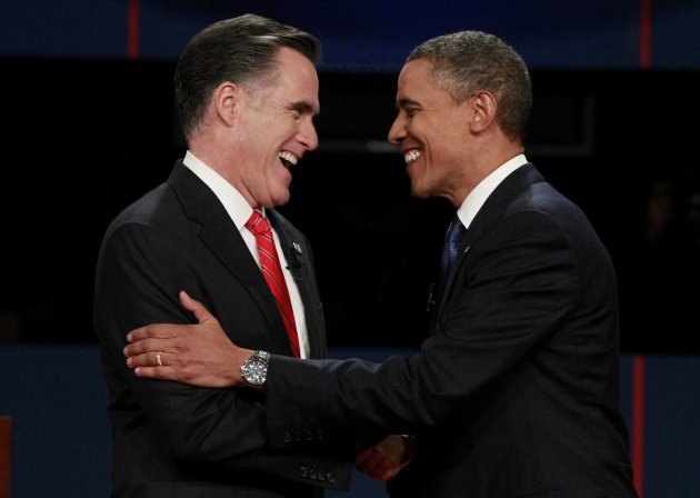 Republican presidential nominee Mitt Romney (L) shakes hands with President Barack Obama at the start of the first 2012 U.S. presidential debate in Denver October 3, 2012.   REUTERS/Jason Reed (UNITED STATES - Tags: POLITICS ELECTIONS USA PRESIDENTIAL ELECTION)