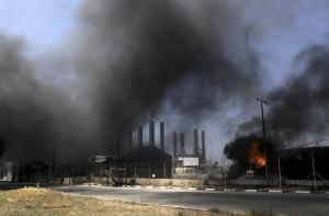 Smoke and flames rise from the Gaza power plant after &hellip;