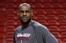 Miami Heat player LeBron James looks on during a team practice ahead of Game 7 of the NBA Finals basketball playoff against the San Antonio Spurs in Miami