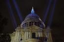 Floodlights light up the sky around St Paul's Cathedral in central London on May 8, 2015, to commemorate the 70th anniversary of the end of the Second World War in Europe