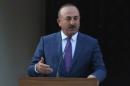 Turkey's Foreign Minister Mevlut Cavusoglu speaks to the media during a visit to northern Cyprus