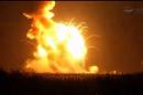 An unmanned Antares rocket is seen exploding seconds after lift off from a commercial launch pad in this still image from NASA video at Wallops Island