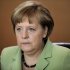 German Chancellor Angela Merkel reacts as she arrives for the weekly cabinet meeting at the chancellery in Berlin, Germany, Wednesday, June 6, 2012. (AP Photo/Markus Schreiber)