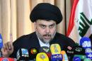 Iraqi Shiite cleric Moqtada al-Sadr delivers a speech from the southern city of Najaf on February 18, 2014