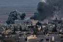 Smoke rising after an airstrike from US-led coalition in the city of Kobane, also known as Ain al-Arab, on November 9, 2014