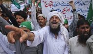 Supporters of the religious political party Markazi Jamiat Ahlehadith Pakistan shout slogans during a protest against an anti-Islam film made in the U.S. mocking Prophet Mohammad, in Karachi September 23, 2012. REUTERS/Akhtar Soomro