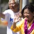 Congresswoman Mazie Hirono, D-Hawaii, right, does some last minute campaigning Saturday, Aug. 11, 2012 in Honolulu.  Hirono is running for the Democratic nomination for a Hawaii seat in the U.S. Senate.  Hawaii holds is primary election today.  (AP Photo/Marco Garcia)