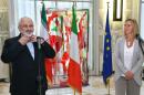 Iranian Foreign minister Mohammad Javad Zarif (L) delivers a during a joint press conference with Italian Foreign Affairs minister and newly appointed European Union Foreign Affairs chief Federica Mogherini in Rome, September 3, 2014