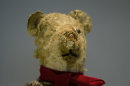 Holocaust survivor Stella Knobel's teddy bear on display at the memorial's "Gathering the Fragments" exhibit at Yad Vashem Holocaust memorial and museum in Jerusalem, Sunday, Jan. 27, 2013., Sunday, Jan. 27, 2013. When Stella Knobel's family had to flee World War II Poland in 1939, the only thing the 7-year-old girl could take with her was her teddy bear. For the next six years, the stuffed animal never left her side as the family wondered through the Soviet Union, to Iran and finally the Holy Land. "He was like family. He was all I had. He knew all my secrets," the 80-year-old now says with a smile. "I saved him all these years. But I worried what would happen to him when I died." So when she heard about a project launched by Israel's national Holocaust memorial and museum to collect artifacts from aging survivors - before they, and their stories, were lost forever - she reluctantly handed over her beloved bear Misiu - Polish for 