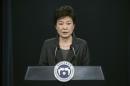 FILE - In this Friday, Nov. 4, 2016, file photo, South Korean President Park Geun-hye speaks during an address to the nation, at the presidential Blue House in Seoul, South Korea. In only a few days, South Korea's biggest scandal in years has done what six decades of diplomacy and bloodshed couldn't, uniting the rival Koreas, at least in one area: indignation against South Korea's leader. North Korean propaganda regularly attacks South Korean President Park Geun-hye. Many South Koreans now seem to be reaching Pyongyang levels of fury over an investigation into whether Park allowed a longtime confidante to manipulate her administration from the shadows. (Ed Jones/Pool Photo via AP, File)
