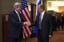 United States Secretary of State Kerry shakes hands with Russian Foreign Minister Lavrov during U.N. General Assembly at U.N. Headquarters in New York