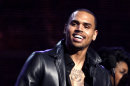 FILE - In this Feb. 12, 2012 file photo, Chris Brown accepts the award for best R&B album for "F.A.M.E." during the 54th annual Grammy Awards in Los Angeles. A Los Angeles judge on Tuesday July 10, 2012 ordered an audit of Brown’s community service hours after a prosecutor said there appeared to be discrepancies in the records about how many hours and days he has performed. Brown was ordered to appear at the next hearing, scheduled for Aug. 21, 2012. (AP Photo/Matt Sayles, File)