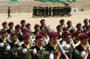 Iraqi Kurdish peshmerga forces march during their graduation ceremony in the northern Iraqi town of Faysh Khabur, on June 29, 2008