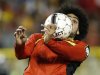 Belgium's Marouane Fellaini heads the ball during their 2014 World Cup qualifying soccer match against Croatia at the King Baudouin Stadium in Brussels