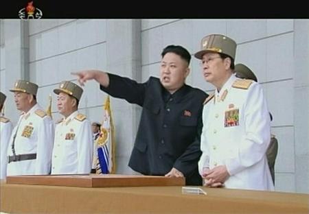North Korean leader Kim Jong-un (2nd R) points during a military ceremony in this still image taken from video footage released on April 25, 2013, by the North's state-run television KRT. REUTERS/KRT via Reuters TV