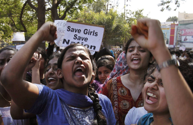 Indian students shout slogans during a protest rally in Hyderabad, India, Monday, Dec. 31, 2012. The gang-rape and killing of a New Delhi student has set off an impassioned debate about what India needs to do to prevent such a tragedy from happening again. The country remained in mourning Monday, two days after the 23-year-old physiotherapy student died from her internal wounds in a Singapore hospital. (AP Photo/Mahesh Kumar A.)