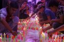 Muslim Shiites light candles during celebrations for the Shaabaniya ceremony in the Iraqi city of Karbala