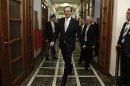 Greece's Prime Minister Samaras arrives for a cabinet meeting in Athens