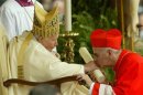 SCOTTISH CARDINAL KEITH MICHAEL PATRICK O'BRIEN KISSES THE POPE'S HAND.