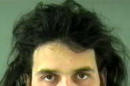 This image provided by the Royal Canadian Mounted Police shows and undated image of Michael Zehaf-Bibeau, 32, who shot a soldier to death at Canada's national war memorial Wednesday, Oct. 22, 2014 and was eventually gunned down inside Parliament by the sergeant-at-arms. (AP Photo/Vancouver Police via The Royal Canadian Mounted Police)
