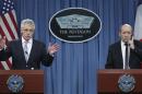 U.S. Secretary of Defense Hagel and French Minister of Defense Le Drian conduct a joint news conference after their meeting at the Pentagon in Washington