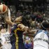 Minnesota Lynx guard Lindsay Whalen (13) tries to steal a pass from Indiana Fever forward Erlana Larkins (2) in the second half of Game 2 of the WNBA basketball Finals Wednesday, Oct. 17, 2012, in Minneapolis. The Lynx won 83-71. (AP Photo/Stacy Bengs)