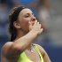 Azarenka of Belarus blows a kiss after defeating Stosur of Australia in their women's singles quarterfinals match at the U.S. Open tennis tournament in New York