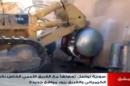 An image grab taken from Syrian television on October 19, 2013 shows a mechanical digger destroying chemical weapons at an undisclosed location in Syria