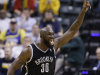 Brooklyn Nets forward Reggie Evans celebrates a tip-in basket in the final 45 seconds of overtime against the Indiana Pacers in an NBA basketball game in Indianapolis, Monday, Feb. 11, 2013. The Nets defeated the Pacers 89-84 in overtime. (AP Photo/Michael Conroy)