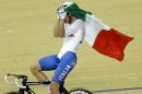 Elia Viviani, of Italy, cries after winning gold in the men's omnium cycling event at the Rio Olympic Velodrome during the 2016 Summer Olympics in Rio de Janeiro, Brazil, Monday, Aug. 15, 2016. (AP Photo/Victor R. Caivano)