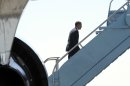 President Barack Obama walks up the steps of Air Force One at San Francisco International Airport in San Francisco, Monday, July 23, 2012. Obama is heading to Reno, Nev., to give remarks at the 113th National Convention of the VFW. (AP Photo/Susan Walsh)