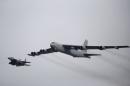 A U.S. Air Force B-52 flies over Osan Air Base in Pyeongtaek