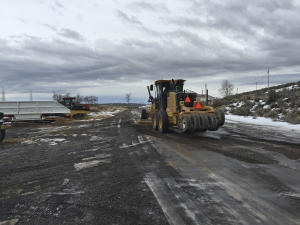 A grader is used on a road at the Malheur National …