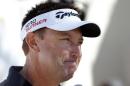 Robert Allenby, of Australia, talks to the media at a practice round for the Phoenix Open golf tournament, Tuesday, Jan. 27, 2015, in Scottsdale, Ariz. (AP Photo/Rick Scuteri)