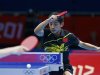 China's Zhang Jike hits a return to Germany's Dimitrij Ovtcharov in their men's singles semifinals table tennis match at the ExCel venue during the London 2012 Olympic Games