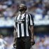 Newcastle's Shola Ameobi reacts following a missed opportunity against Rangers during their friendly soccer match at Ibrox Stadium, Glasgow