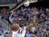 Arizona's Solomon Hill (44) dunks in front of Harvard's Laurent Rivard (0) in the first half during a third-round game in the NCAA men's college basketball tournament in Salt Lake City Saturday, March 23, 2013. (AP Photo/Rick Bowmer)