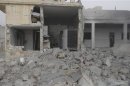 A view of buildings damaged by missiles fired in Taftanaz