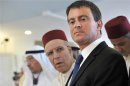France's Interior Minister Valls and Morocco's Minister of Endowments and Islamic Affairs Toufiq attend with other guests the official inauguration of Grand Mosque in Strasbourg