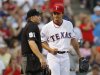 Rangers' Darvish talks with home plate umpire Knight in the second inning of MLB American League baseball game against Rays in Arlington
