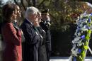 President Barack Obama, first lady Michelle Obama, former President Bill Clinton and his wife, former Secretary of State Hillary Rodham Clinton, pause during a wreath laying ceremony in honor of President John F. Kennedy, Wednesday, Nov. 20, 2013, at the JFK gravesite at Arlington National Cemetery in Arlington, Va. Friday will mark the 50th anniversary of the JFK assassination. (AP Photo/Pablo Martinez Monsivais)