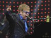 In this photo taken Sunday Nov. 25, 2012, pop icon Elton John performs during his concert in Beijing. John publicly dedicated his only concert in Beijing to Chinese artist and political critic Ai Weiwei, sending a murmur of shock through audience members accustomed to tight censorship of entertainment. (AP Photo) CHINA OUT