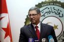 Tunisian Prime Minister Habib Essid delivers a speech during a joint news conference with Prime Minister of Libya's unity government Fayez Seraj